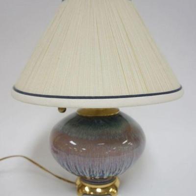 1166	DRIP GLAZED POTTERY TABLE LAMP ON BRASS BASE, APPROXIMATELY 15 IN H

