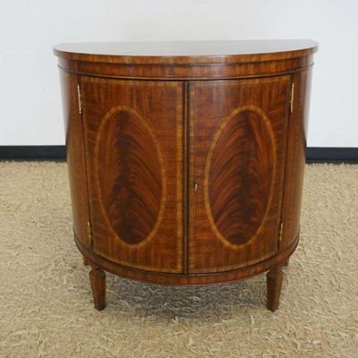 1220	MAITLAND SMITH MAHOGANY DEMI LUNE 2 DOOR CABINET WITH OVAL MEDALLION INLAY AND BANDED TRIM, APPROXIMATELY 32 IN X 19 IN X 32 IN H
