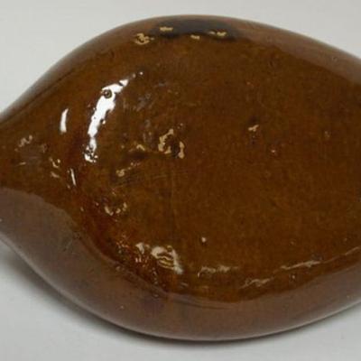 1074	STONEWARE BROWN GLAZED FOOT WARMER, APPROXIMATELY 13 IN H

