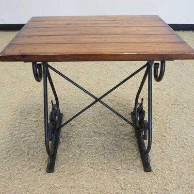 1201	WOOD TOP STAND ON FANCY WROUGHT IRON BASE, APPROXIMATELY 28 IN X 22 IN X 28 IN H
