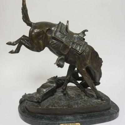 1118	CONTEMPORARY REMINGTON BRONZE *WICKED PONY* ON MARBLE BASE, APPROIMATELY 20 IN X 10 IN X 23 IN H
