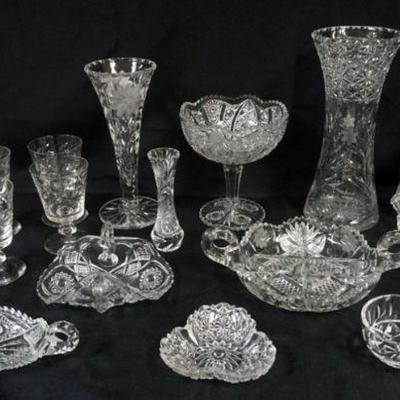 1142	LARGE SELECTION OF PRESSED GLASS ITEMS INCLUDING VASES, COMPOTES, NAPPIES, DIVIDED DISH, ETC., LARGEST PIECE APPROXIMATELY 12 IN H
