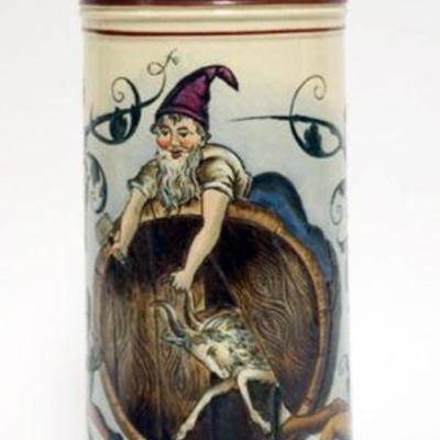 1072	LARGE GERMAN STEIN WITH COMICAL IMAGE OF GOAT JUMPING OUT OF A WOOD KEG, APPROXIMATELY 16 IN H, #1189
