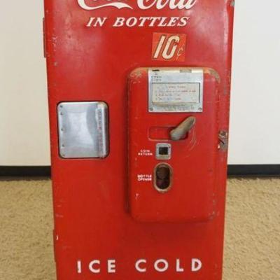 1182	ANTIQUE 10 CENT COCA-COLA MACHINE, WORKING CONDITION UNKNOWN, APPROXIMATELY 25 IN X 25 IN X 65 IN H
