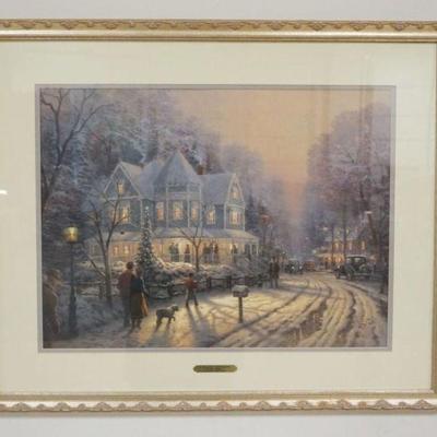 1217	THOMAS KINKADE FRAMED LITHO, ARTIST SIGNED AND NUMBERED CHRISTMAS COTTAGE IX A HOLIDAY GATHERING 1300/6850, APPROXIMATELY 33 IN X 27...