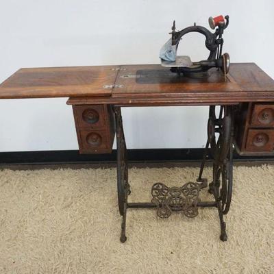 1160A	ANTIQUE WILCOX & GIBBS TREADLE SEWING MACHINE

