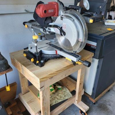 Table saw with stand on wheels