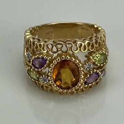 A 14k Yellow Gold Ornate 2 Carat Oval-Citrine, Peridot & Amethyst Ring