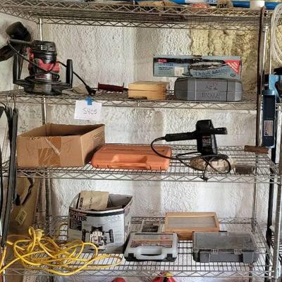 Shelving Unit With Various Tools, Gas Cans, And More