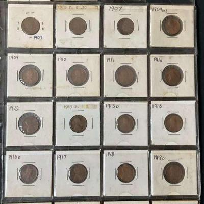 Assortment of wheat pennies labeled and encased