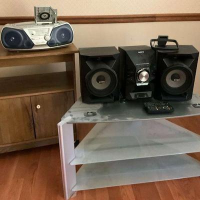 Stereo systems with media tables and audio accessories