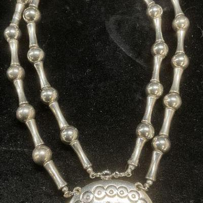 Estee Lauder Silver Tn Perfume Locket Necklace
