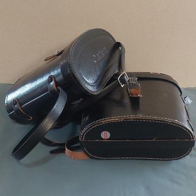 Two Binoculars. Canon & Raleigh 