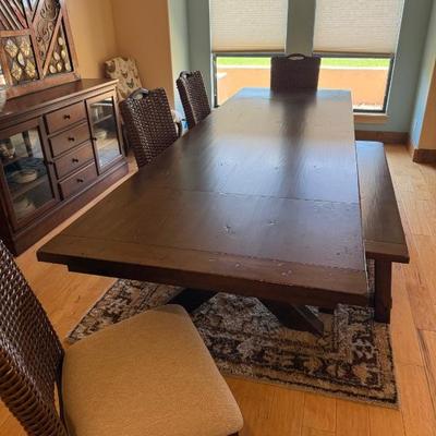 Table with 4 chairs and a bench.  Great condition 