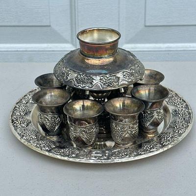 SILVER PLATE KIDDISH FOUNTAIN | Silver plate kiddish fountain with 8 spouts and 8 corresponding glasses with matching platter....