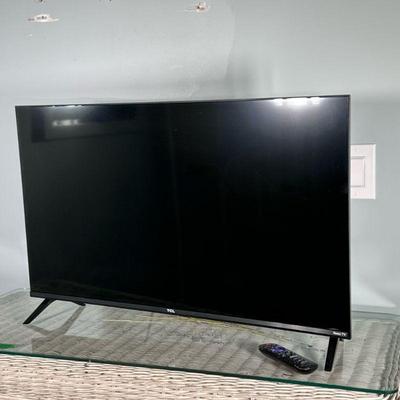 TCL Roku Smart TV | TCL Model 32S359. On footed stand comes with remote. Dimensions: h. 18 x w. 28 x d. 7 in (32” screen measured on a...