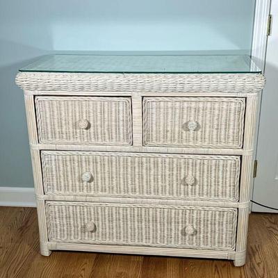 White Wicker Dresser | Having split width drawers over 2 full width drawers with glass top . Dimensions: h. 35.5 x w. 38.5 x d. 19 in
