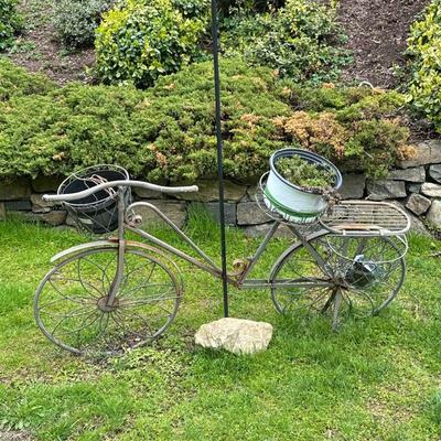 Wrought Iron Bicycle Form Plant Stand | Interesting wrought iron bicycle form plant stand with front & side baskets. Dimensions: h....