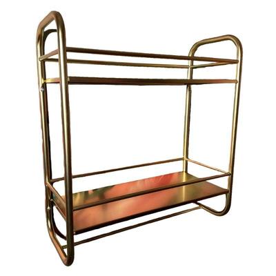 Brushed Metal Wall Shelf | Gold tone, two shelves with lower towel rack. Dimensions: h. 21.75 x w. 20 x d. 8.25 in

