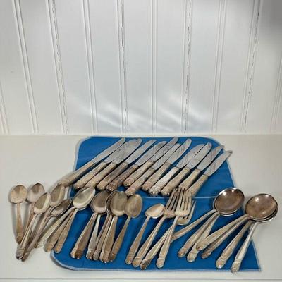 (39pc) HOLMES & EDWARDS INLAID SILVER FLATWARE | Partial inlaid silver flatware service including; 7 soup spoons; 17 spoons; 3 forks;...