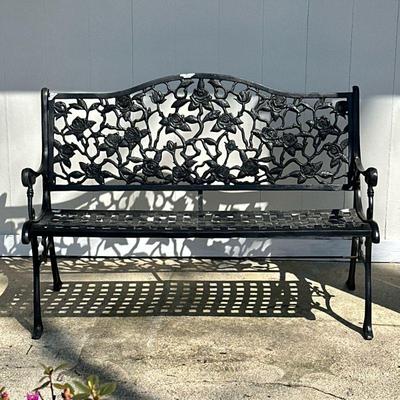 ALUMINUM OUTDOOR ROSE GARDEN BENCH | Black coated cast aluminum, with rose-patterned back rest and woven style seat. Dimensions: h. 34.25...
