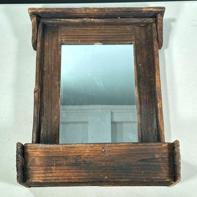 Vintage Wood Mirror | Vintage carved wood mirror with small caddy on bottom. Dimensions: h. 19 x w. 14.5 x d. 6 in

