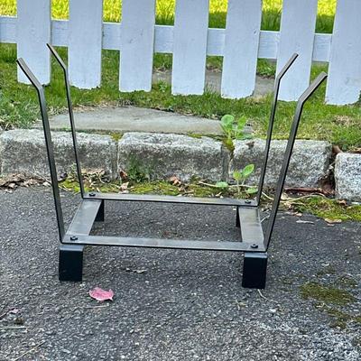 Metal Log Holder | Metal tapered square form log stand Dimensions: h. 14.5 x w. 19.5 x d. 12.25 in.
