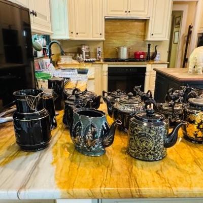 Red pottery with black lacquer coating.  England 1800’s.