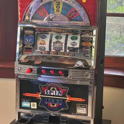 Mecca Spin Lucky Triple 7 Slot Machine with stand.