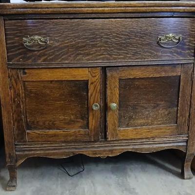 Solid walnut cabinet. Needs refinishing only. Build is solid.. 29.5"h x 34" w x 18.25"d. Asking $100.
