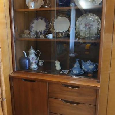 China cabinet measuring 68.5"h x 36"w x 17.5"d. Solid build with some minor scratches. Asking $50.