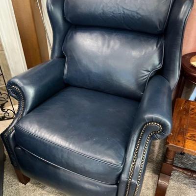Studded leather armchair