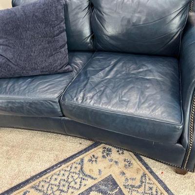 Studded leather couch