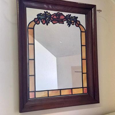 Multiple Layered Art Under Mirror