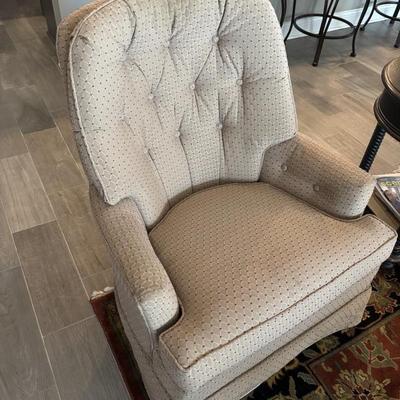 There are 2 of these matching chairs. Rock and swivel 