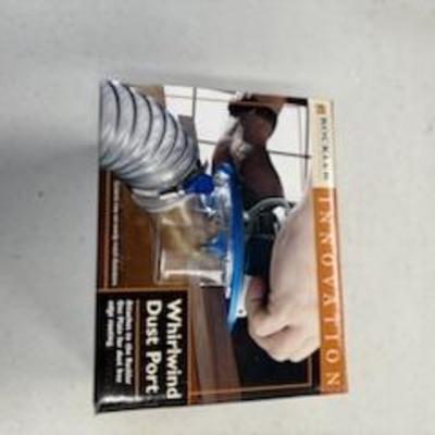 Rocking whirlwind dust port