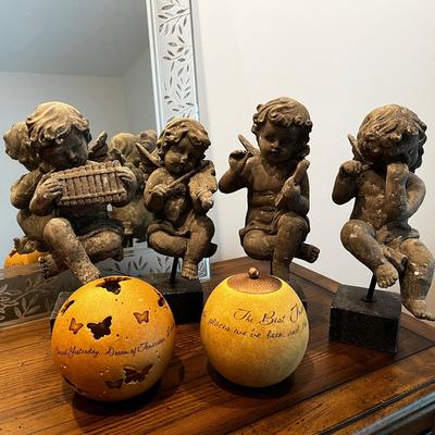 Set Of 4 Cherub Sculptures On Stands