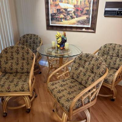 
Rattan Swivel Caster Chairs and Table 5 Pieces Dining Set
