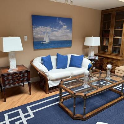 Long coffee table $50
-Sunset rattan style loveseat $350