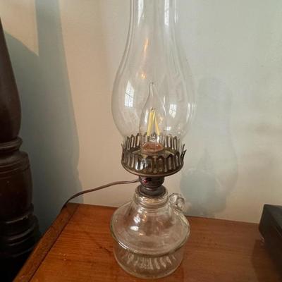 Antique oil lamp converted to electric.