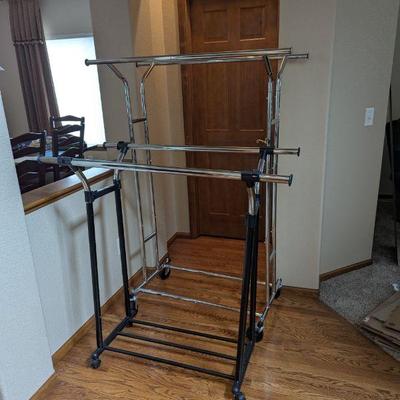 Lot #82 - Two Adjustable Clothing Racks. 