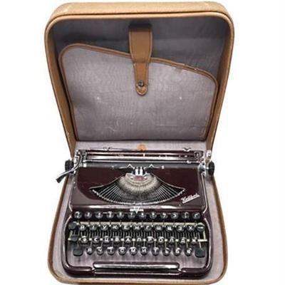 Lot 169   
Kolibri Giroma (Ukrainian Keys) Portable 1950-1960s Typewriter, Burgundy Color