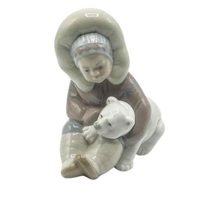 Lot 008-038   
Lladro, Eskimo Playing Boy With Polar Bear, # 1195, 1972 Retired