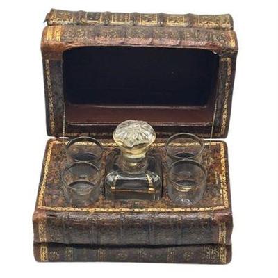 Lot 010-175  
1950s Leather Bound Book Hidden Tantalus