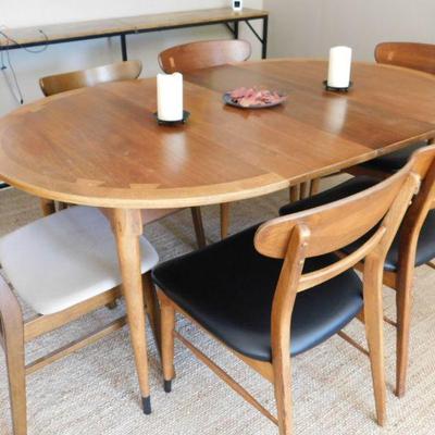 Please note, the white chairs have been added to this set to make a table for 6 by the client and have been removed. The white chairs are...