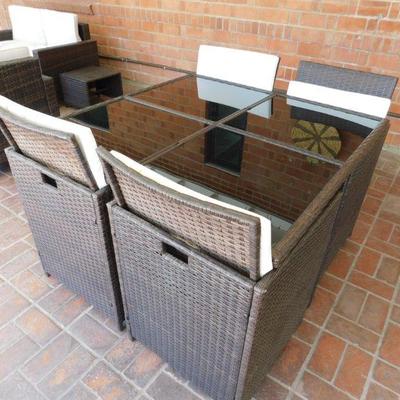 This set had fold down chair backs, and a foot stool under every chair. The chair and foot stool will slide as a unit under the table for...