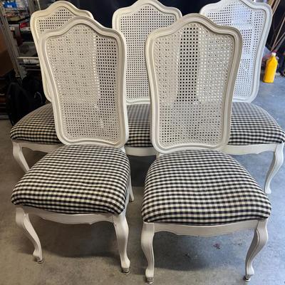 Five White Cane Back Chairs With Cloth Seats