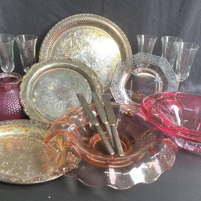 Silver plated Trays And Knives With Pink Champagne Glasses And Dishes