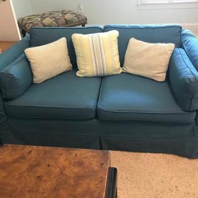 60" loveseat with slip cover $149
