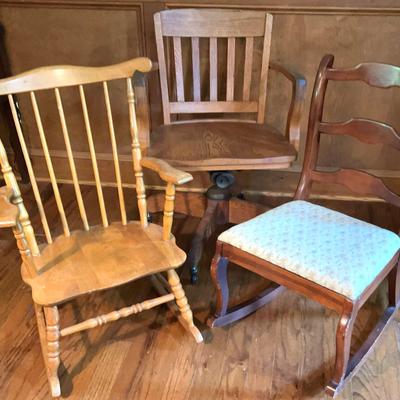 Two Rocking Chairs And A  Vintage Banker’s Chair